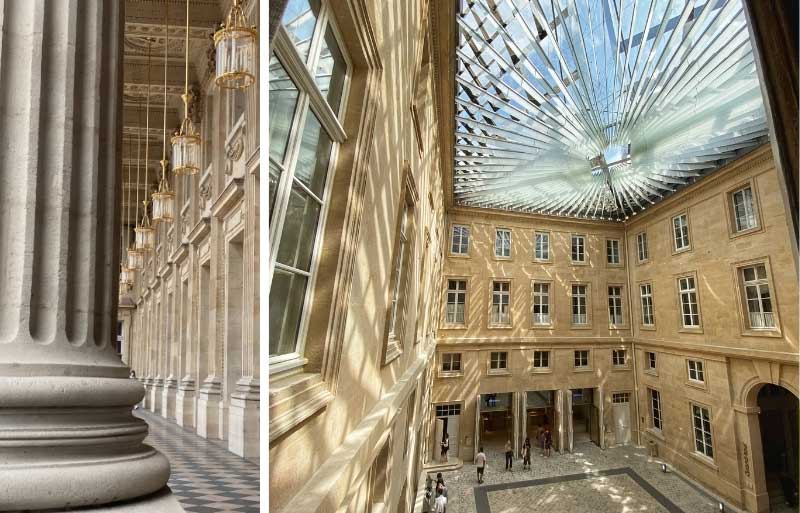 Longue galerie flanquée d'impressionnantes colonnes de pierre et éclairée par des lustres à l'Hôtel de la Marine Paris